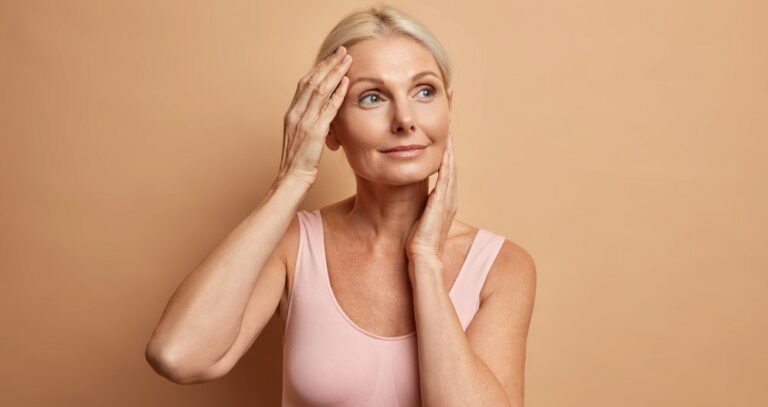 portrait-mature-elderly-european-woman-touches-face-gently-has-perfect-skin-looks-thoughtfully-away-enjoys-her-soft-complexion-cares-about-appearance-satisfied-after-anti-aging-procedure (2)